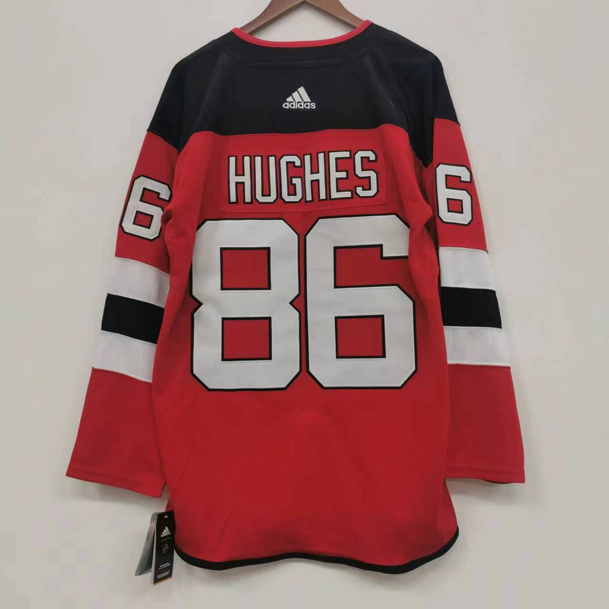 Jack Hughes New Jersey Devils Official NHL Adidas Jersey red product image 3, provided for visual reference and product