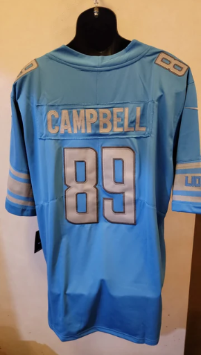 Dan Campbell Detroit Lions Jersey light blue product image 1, provided for visual reference and product detail review