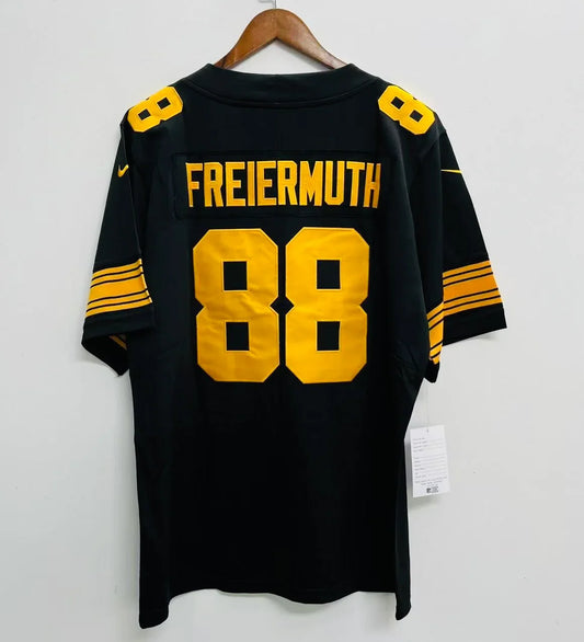 Pat Freiermuth Youth Kids Pittsburgh Steelers Official NFL Nike Color Rush Jersey product image 1, provided for visual
