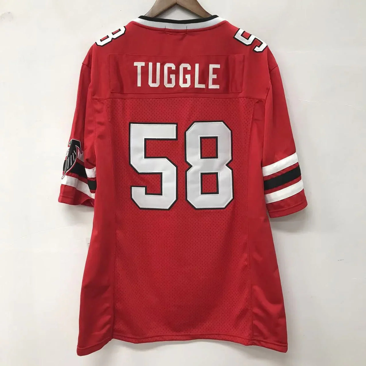 Jesse Tuggle 1989 Atlanta Falcons NFL Mitchell & Ness Jersey product image 1, provided for visual reference and product