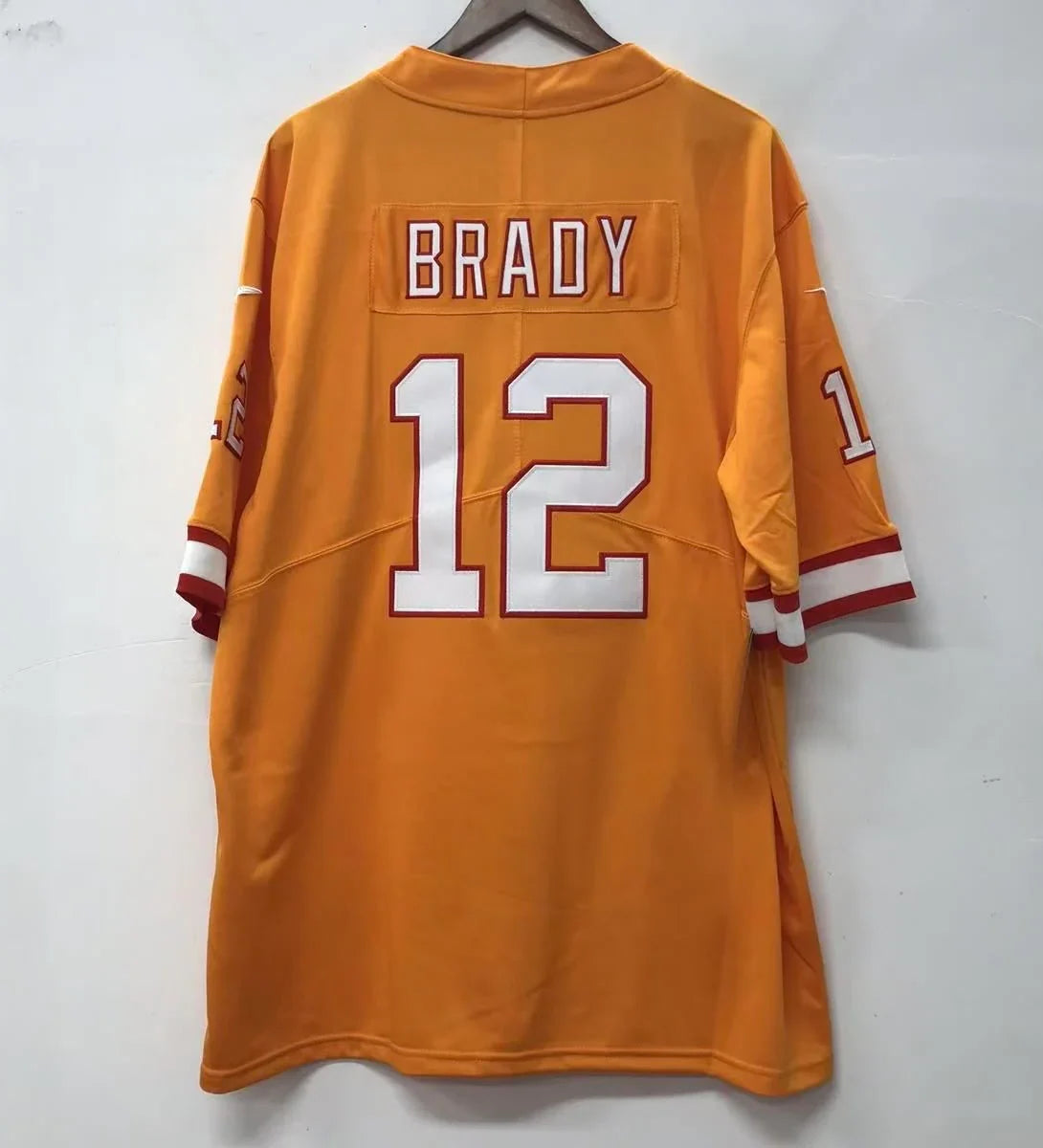Tom Brady Tampa Bay Buccaneers retro pumpkin throwback Jersey product image 1, provided for visual reference and product
