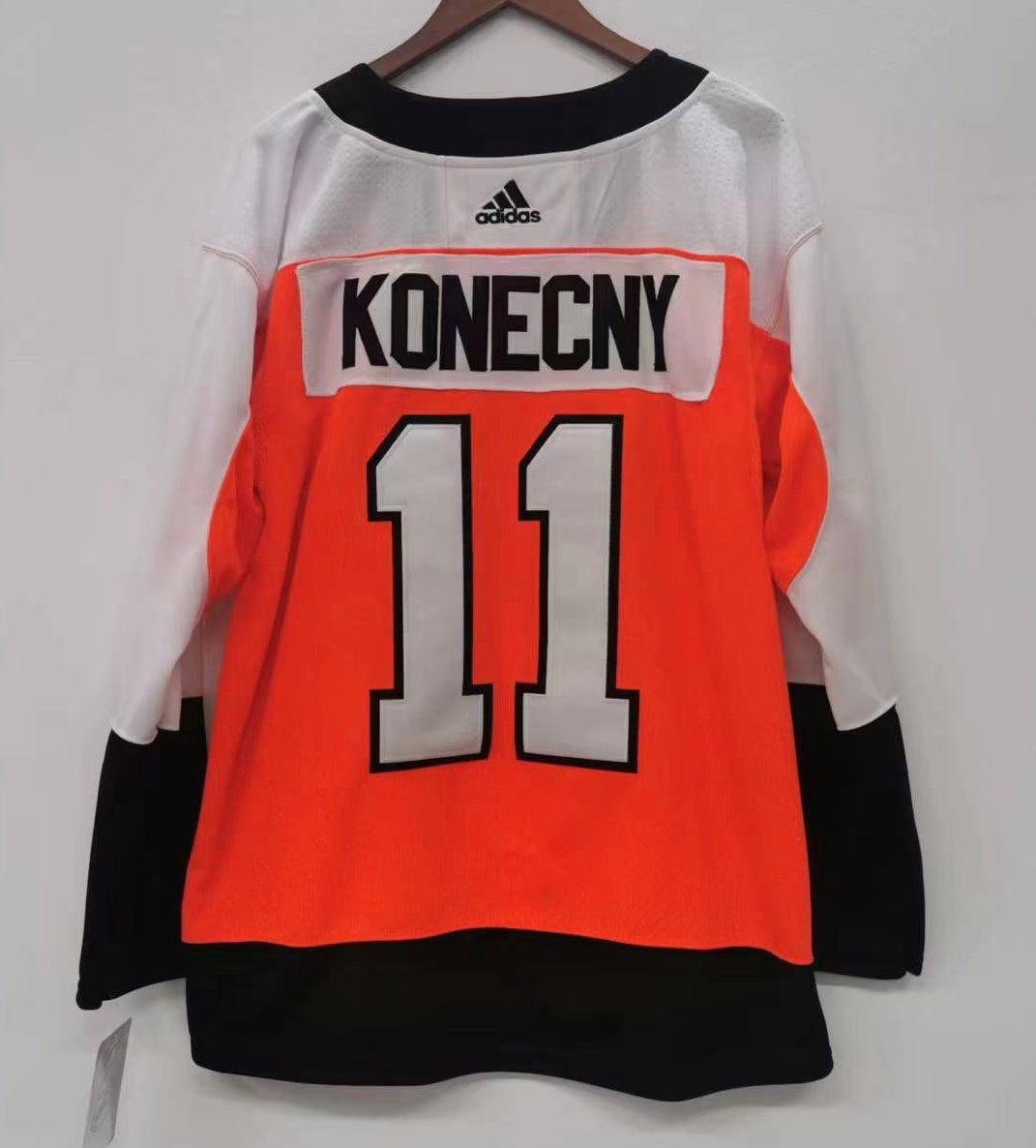 Travis Konecny Philadelphia Flyers Official NHL Adidas Jersey product image 1, provided for visual reference and product